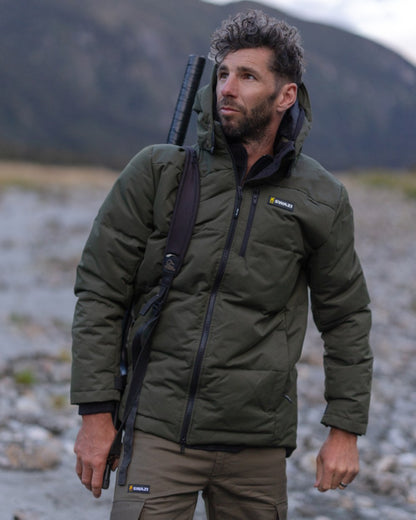 Olive coloured Swazi Mens Jack Frost Insulation Jacket on forest background 