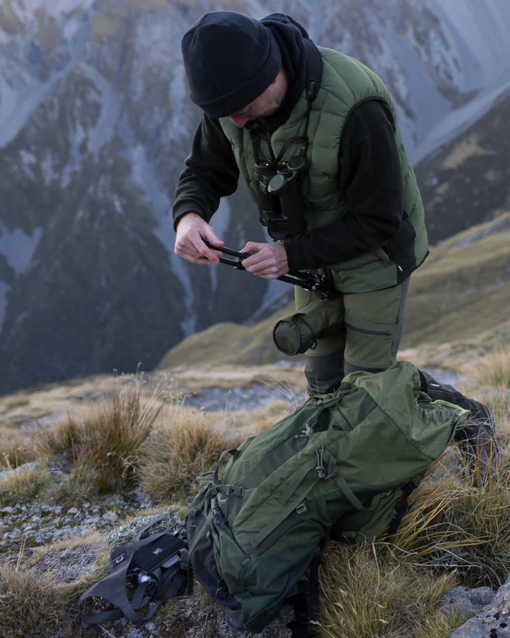 Olive coloured Swazi Thorso Vest on mountain background 