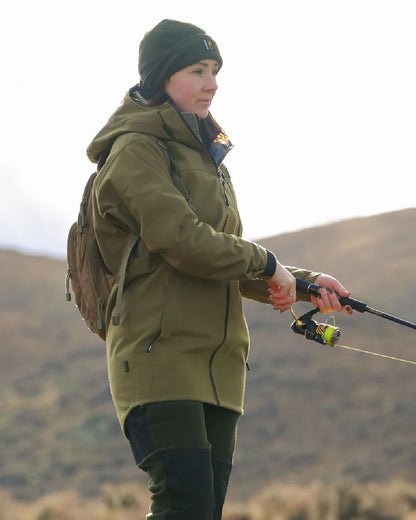 Tussock Green coloured Swazi Womens Artemis Jacket on nature backgorund 