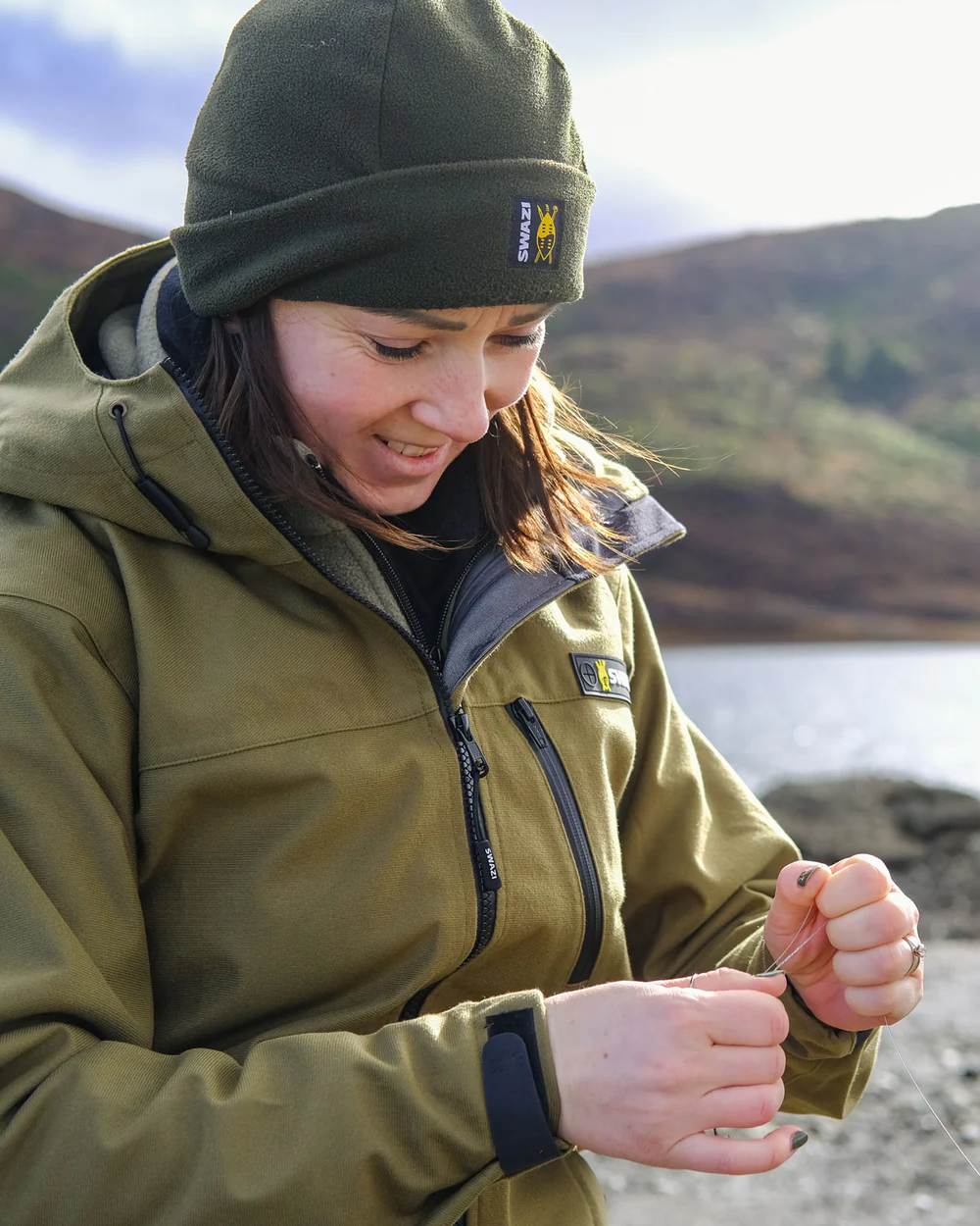 Tussock Green coloured Swazi Womens Artemis Jacket on nature backgorund 