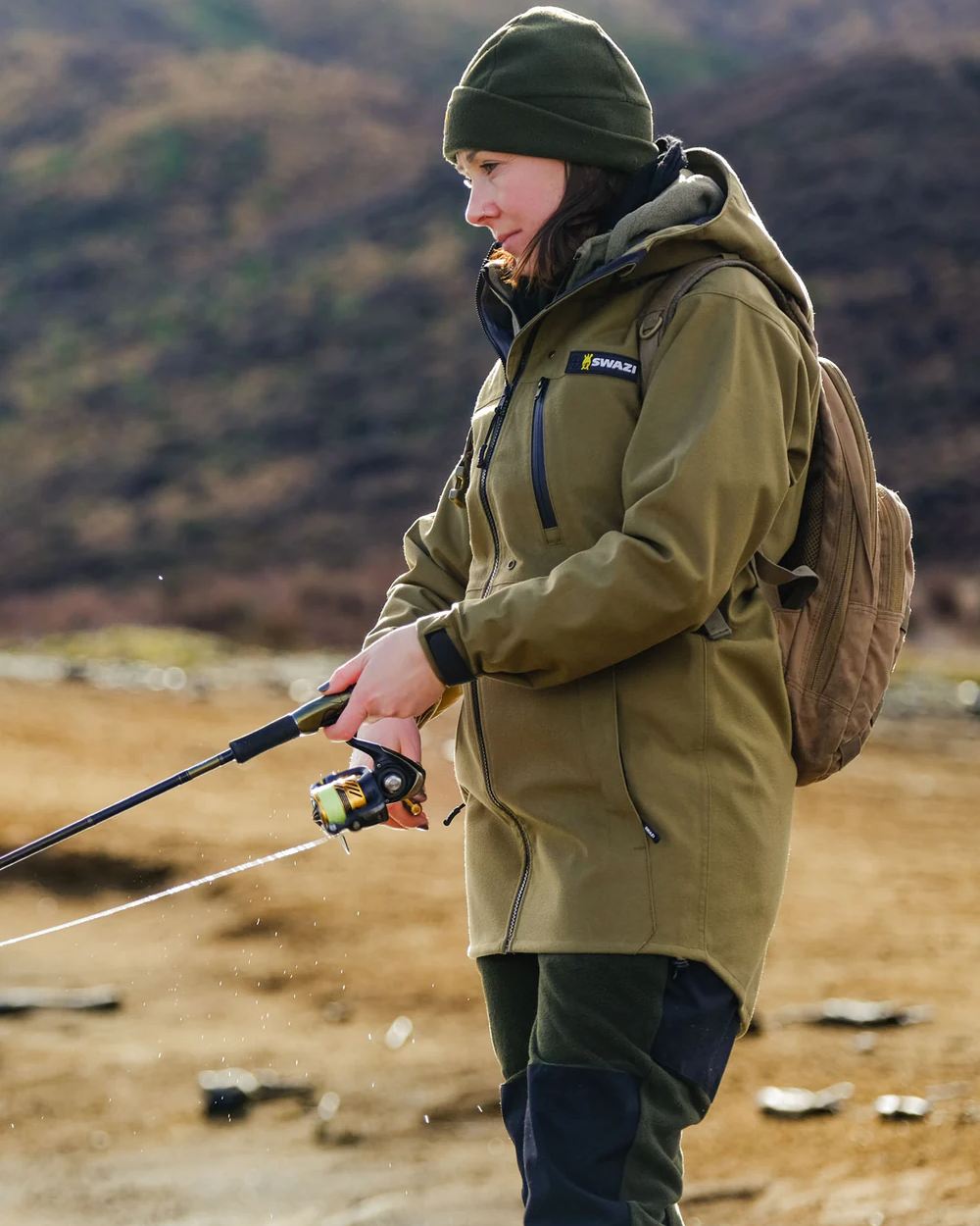 Tussock Green coloured Swazi Womens Artemis Jacket on nature backgorund 