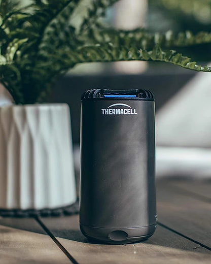 Graphite coloured Thermacell Halo Mini Protector on blurry background 