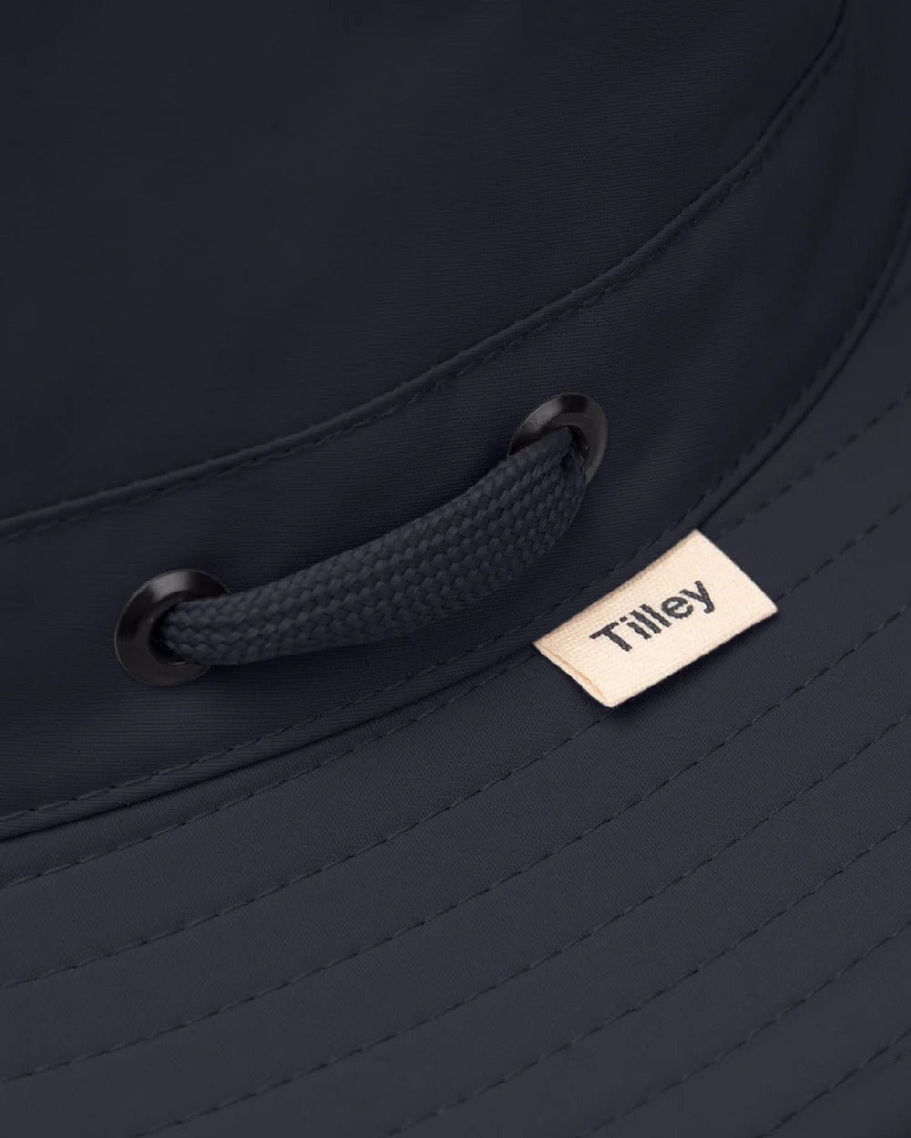 Midnight Navy Coloured Tilley Airflo Broad Brim Sun Hat on white background 