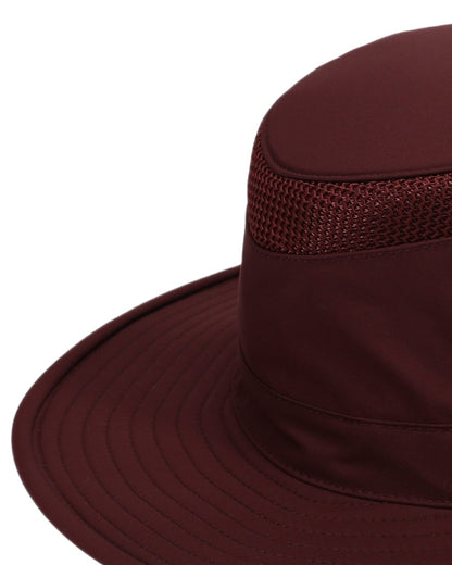 Mulberry coloured Tilley Hats Airflo Broad Brim Sun Hat  on white background 