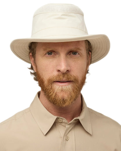Light Stone Coloured Tilley Airflo Medium Brim Recycled Hat on white background 