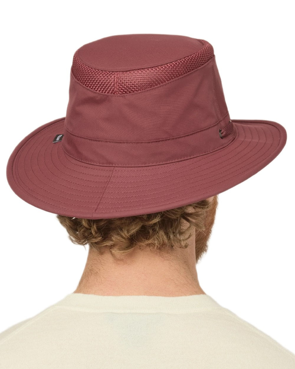 Mulberry Coloured Tilley Airflo Medium Brim Recycled Hat on white background 