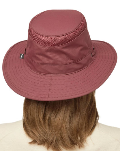 Mulberry Coloured Tilley Airflo Medium Brim Recycled Hat on white background 