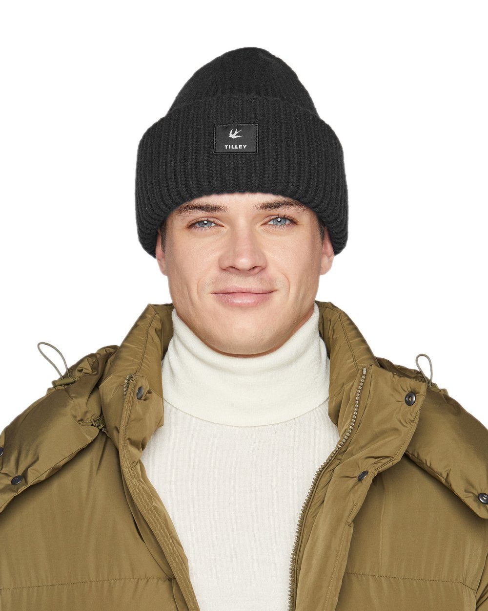 Black Coloured Tilley Alpine Beanie on white background 