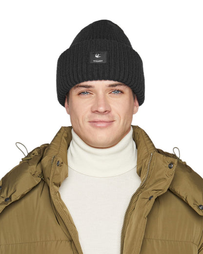 Black Coloured Tilley Alpine Beanie on white background 