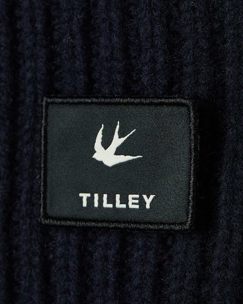 Navy Coloured Tilley Alpine Beanie on white background 