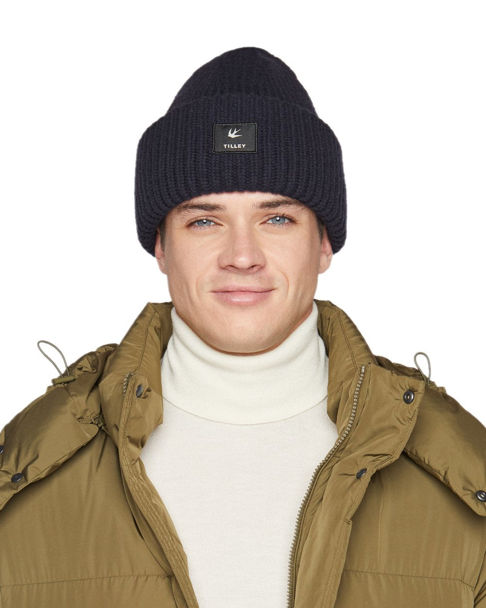 Navy Coloured Tilley Alpine Beanie on white background 