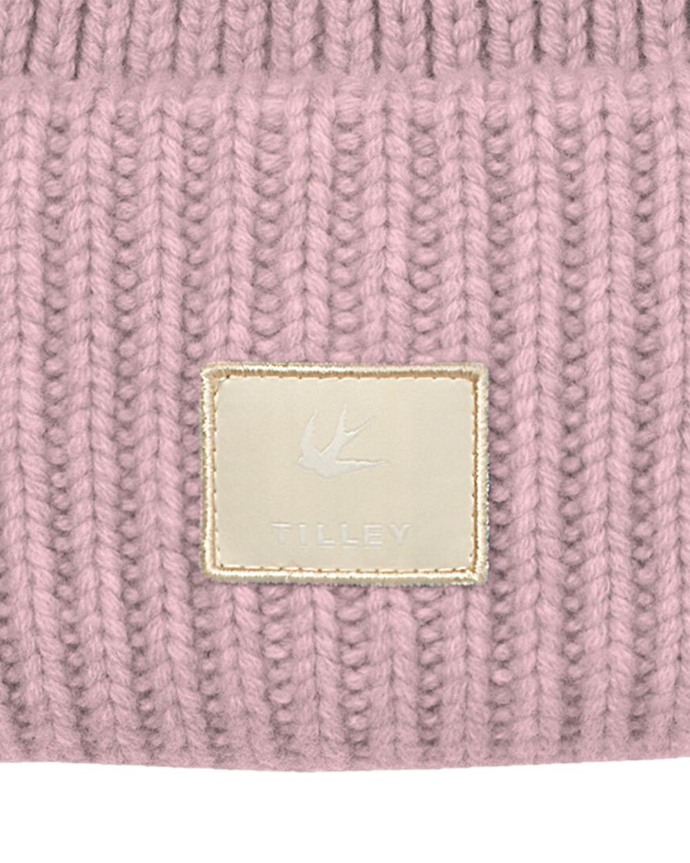 Pink Coloured Tilley Alpine Beanie on white background 