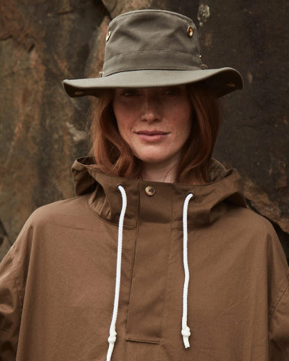 Olive Coloured Tilley Classic T3 Cotton Hat on outdoor background 