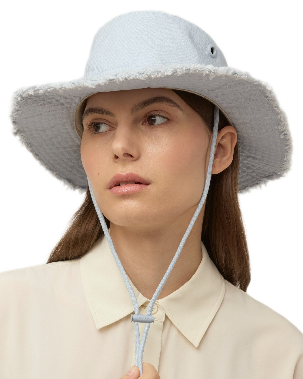 Ice Blue Coloured Tilley Fringe Wanderer Hat on white background 