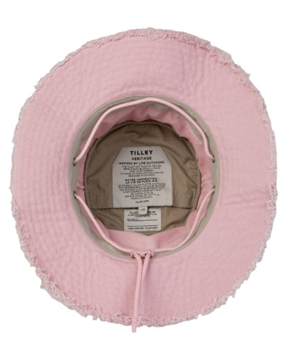 Light Pink Coloured Tilley Fringe Wanderer Hat on white background 