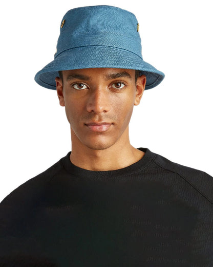 Denim Blue Coloured Tilley Iconic T1 Bucket Hat on white background 