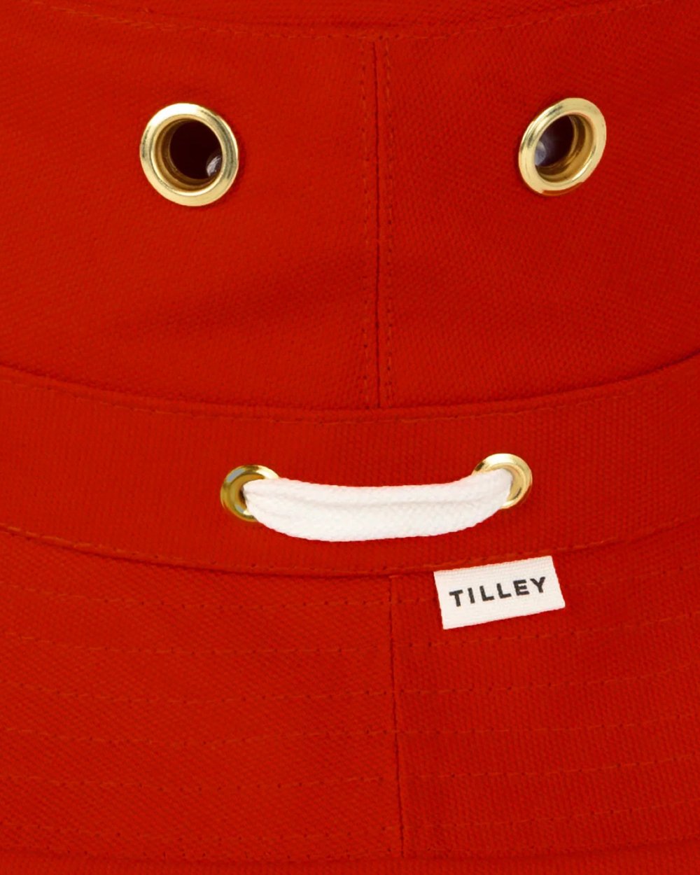 Red coloured Tilley Iconic T1 Bucket Hat on white background 