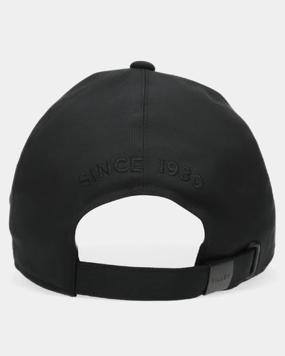 Black Coloured Tilley New Tech Travel Cap on white background 