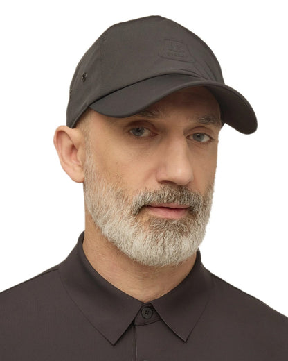 Black Coloured Tilley New Tech Travel Cap on white background 
