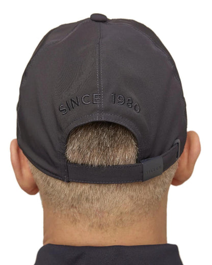 Navy Coloured Tilley New Tech Travel Cap on white background 