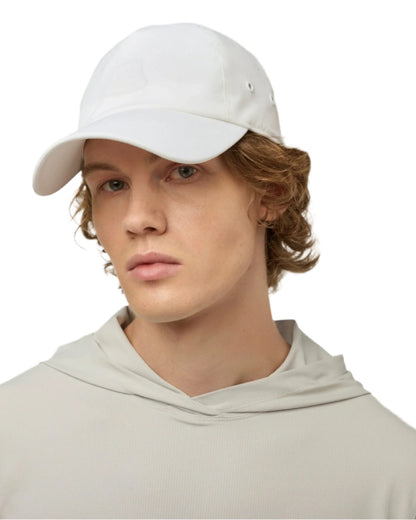 White Coloured Tilley New Tech Travel Cap on white background 