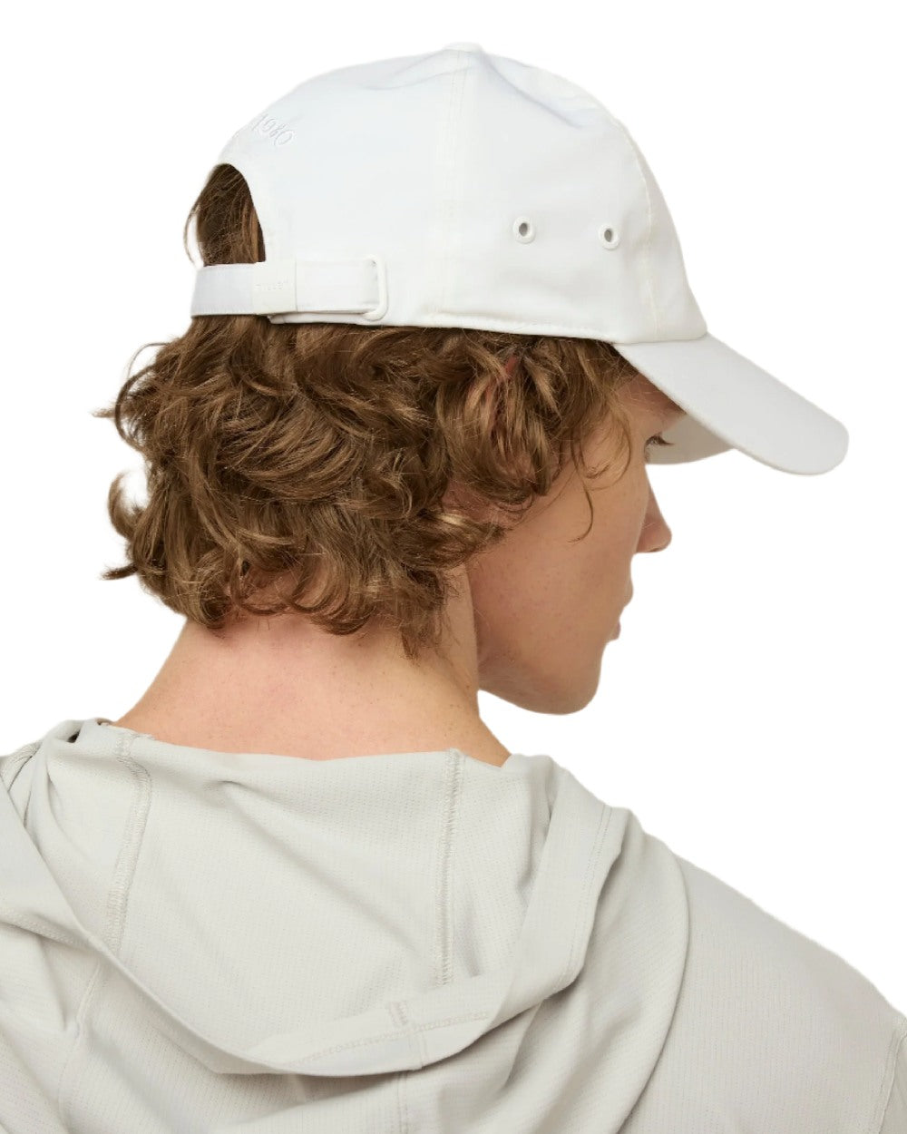 White Coloured Tilley New Tech Travel Cap on white background 