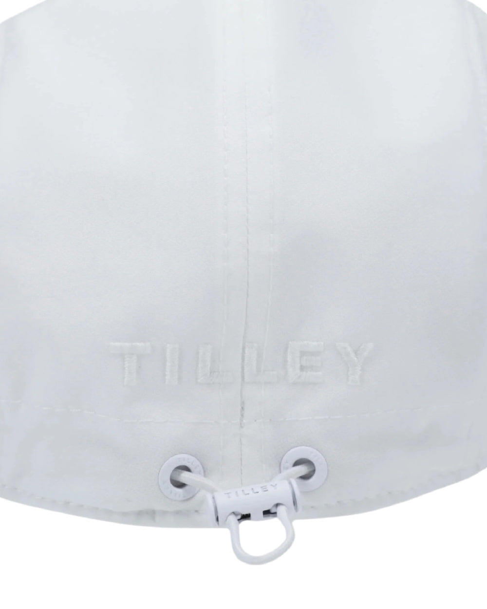 White Coloured Tilley New Tech Travel Cap on white background 