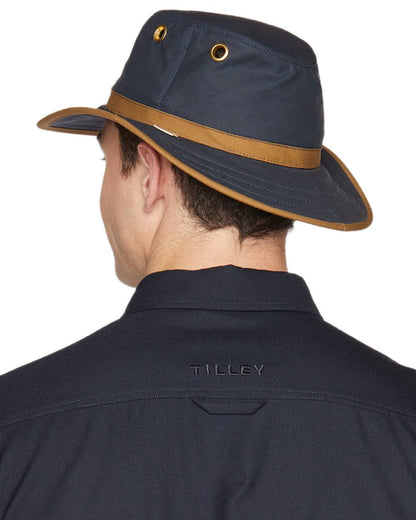 Navy British Tan Coloured Tilley Outback Waxed Cotton Hat on white background 