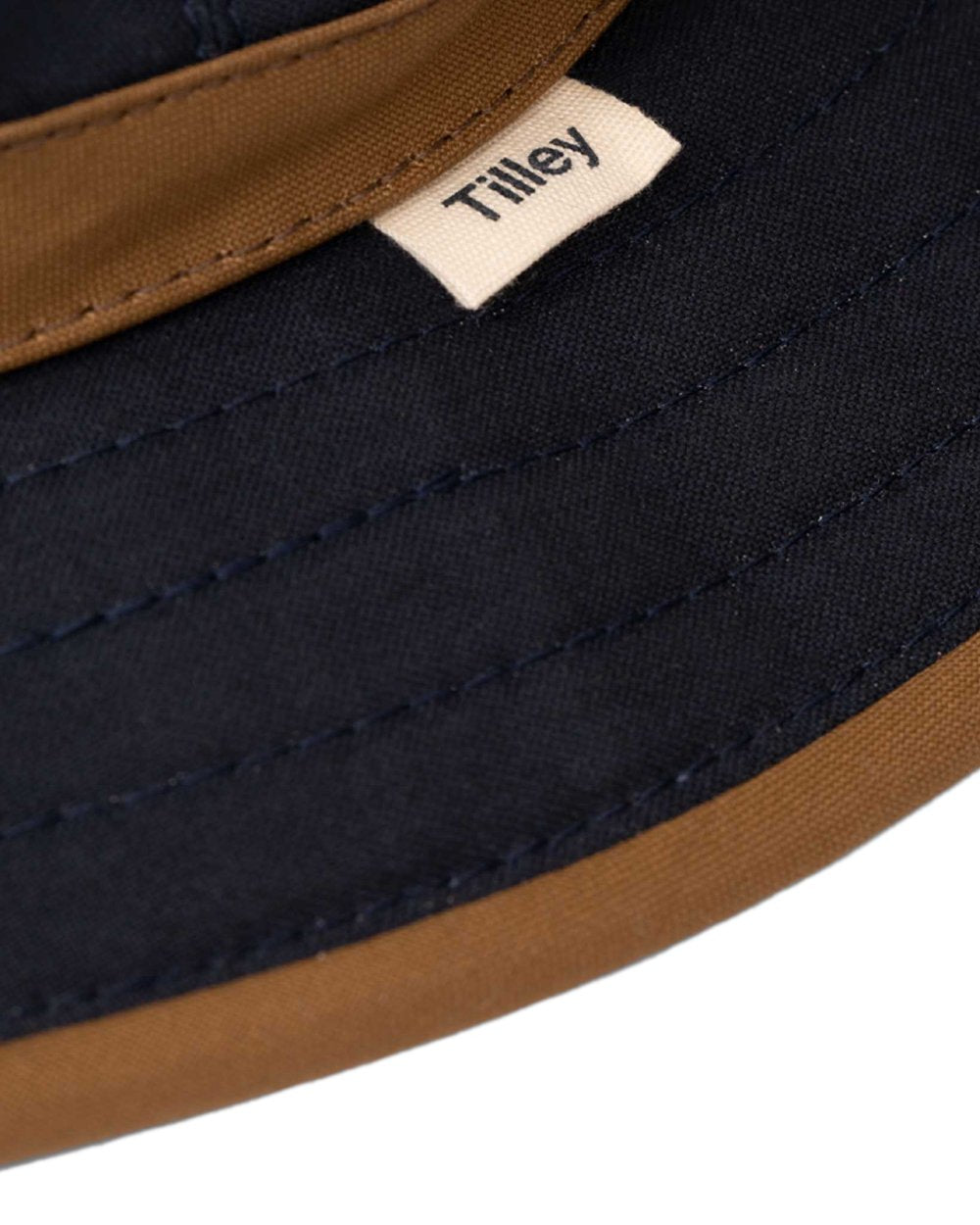 Navy British Tan Coloured Tilley Outback Waxed Cotton Hat on white background 