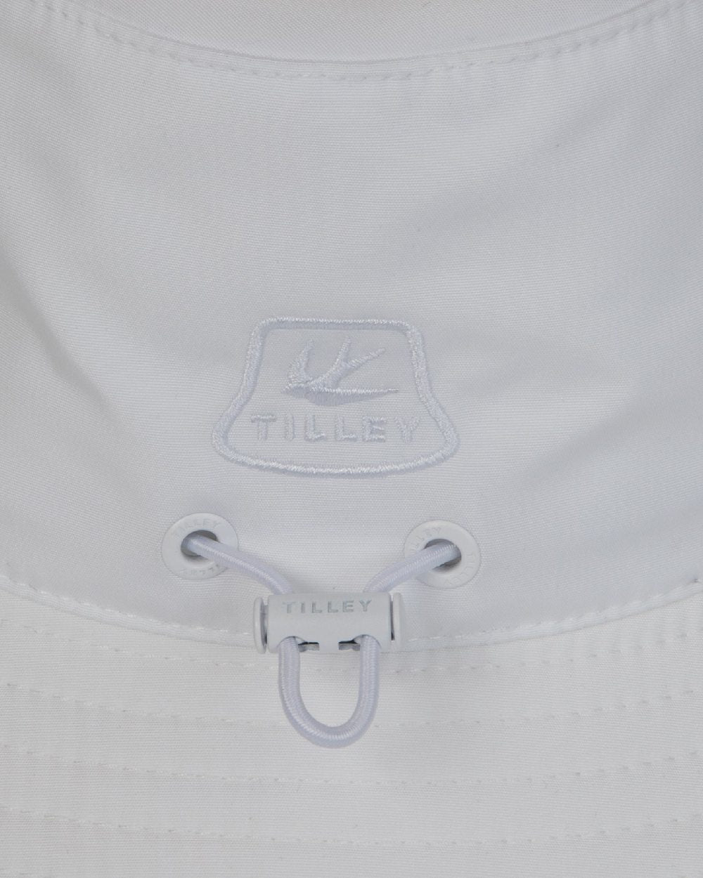 White Coloured Tilley T1 Performance Bucket Hat on white background 