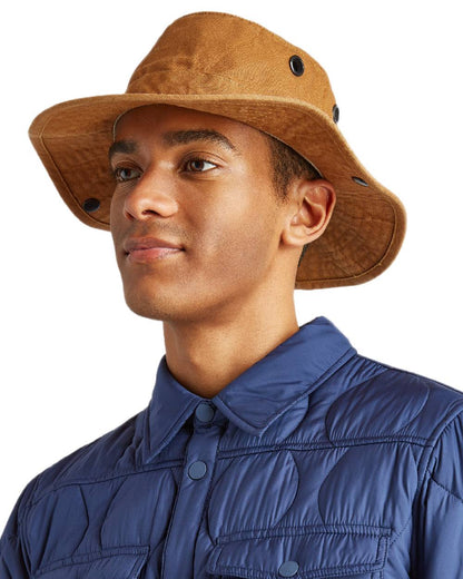 Dark Camel Coloured Tilley T3 Wanderer Hat on White background 