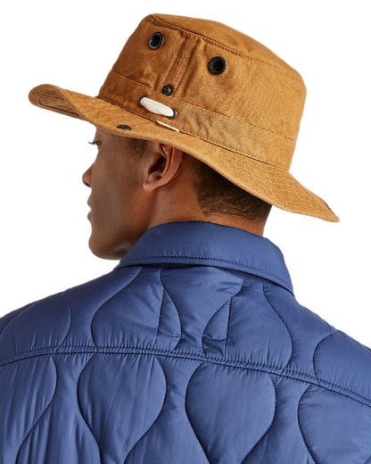 Dark Camel Coloured Tilley T3 Wanderer Hat on White background 