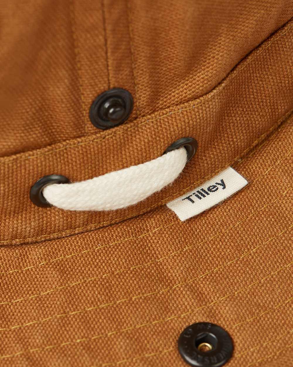 Dark Camel Coloured Tilley T3 Wanderer Hat on White background 