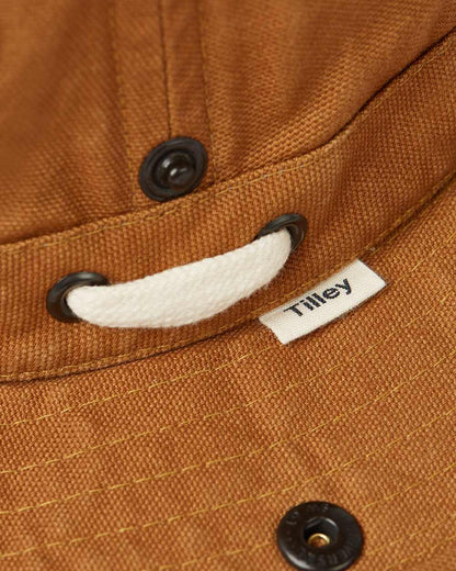Dark Camel Coloured Tilley T3 Wanderer Hat on White background 