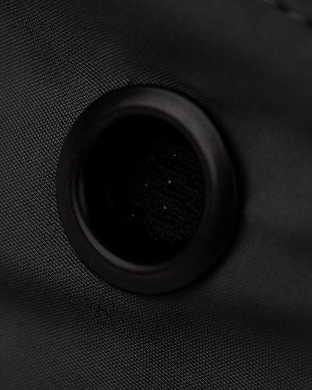 Black coloured Tilley TWS1 All Weather Hat on white background 