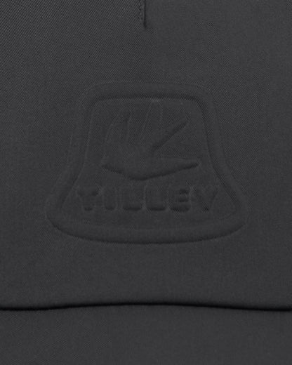 Black Coloured Tilley Travelers Cap on white background 