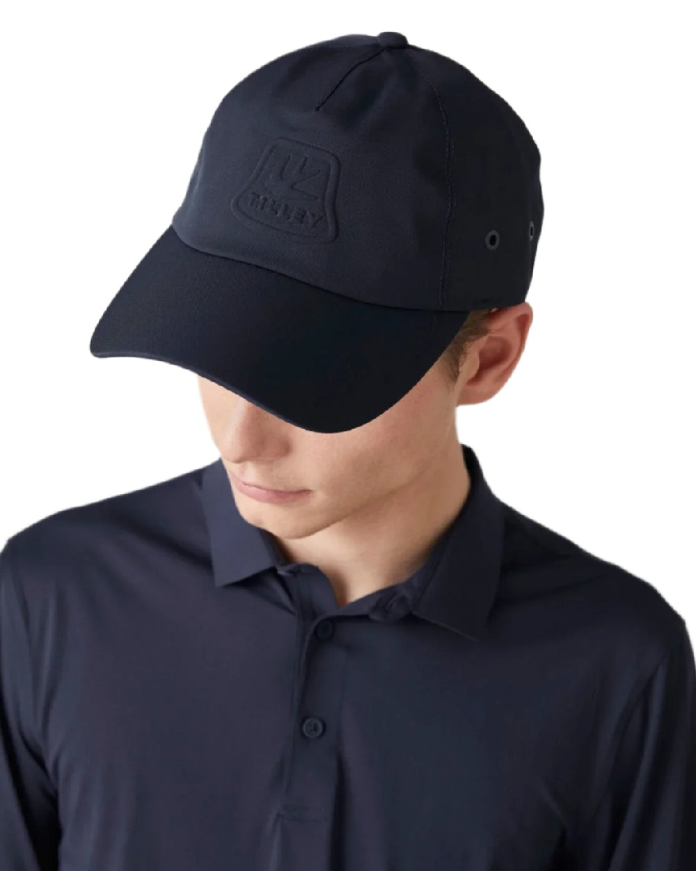 Navy Coloured Tilley Travelers Cap on white background 