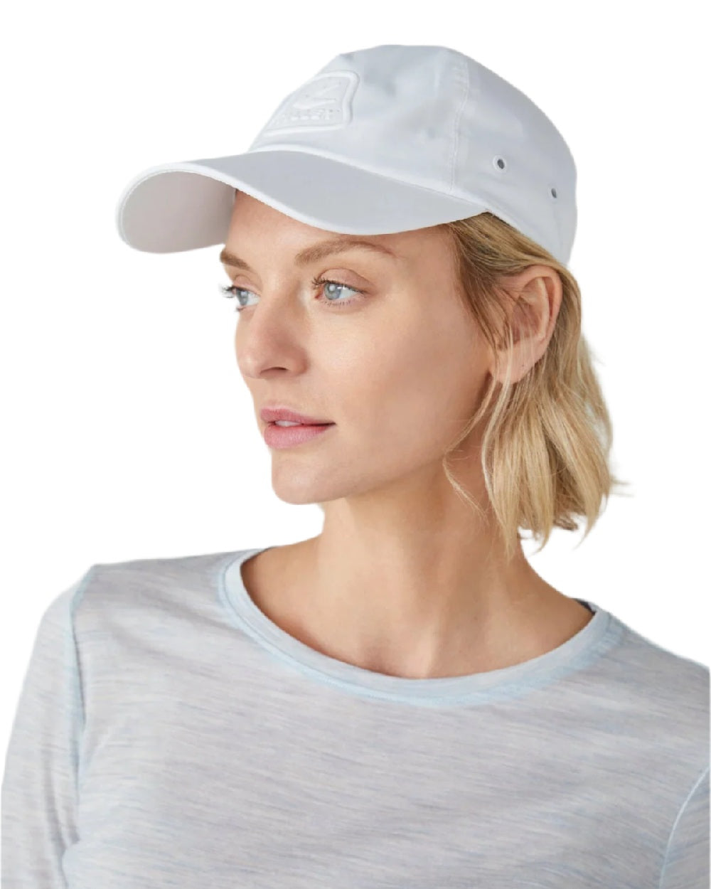 White Coloured Tilley Travelers Cap on white background 