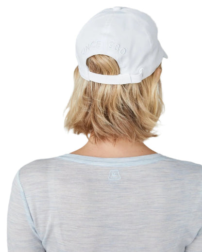 White Coloured Tilley Travelers Cap on white background 