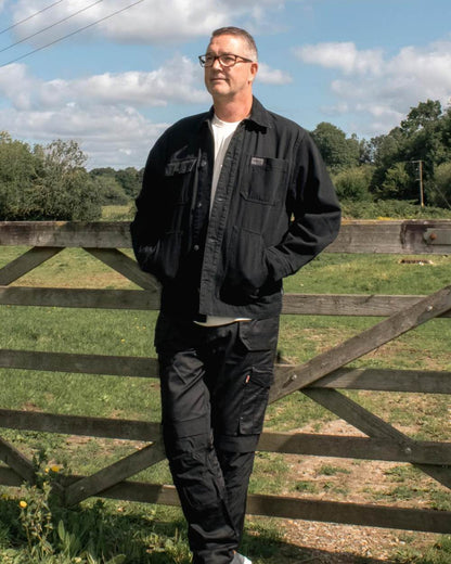 Black coloured TuffStuff Ranger Jacket on grassy background 