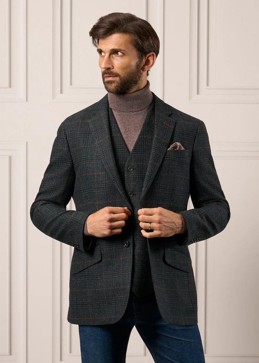 Green Check Coloured Alan Paine Surrey Mens Tweed Lined Waistcoat on wall background 