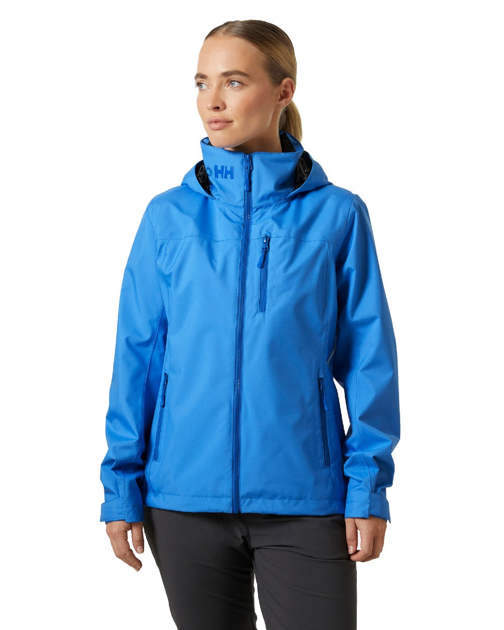 Ultra Blue coloured Helly Hansen womens crew hooded sailing jacket 2.0 on white background 