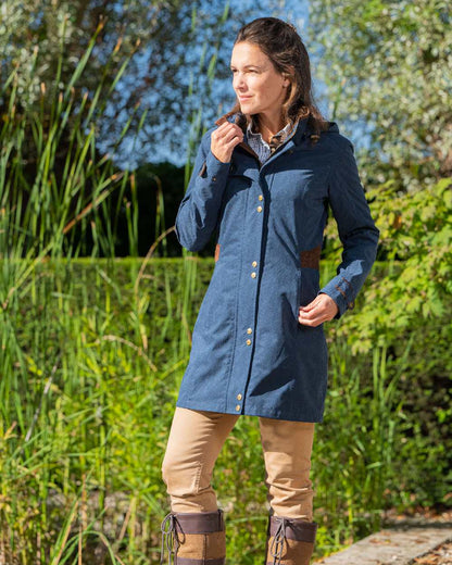 Navy Blue Coloured Baleno Harmony Waterproof Coat on farm background 