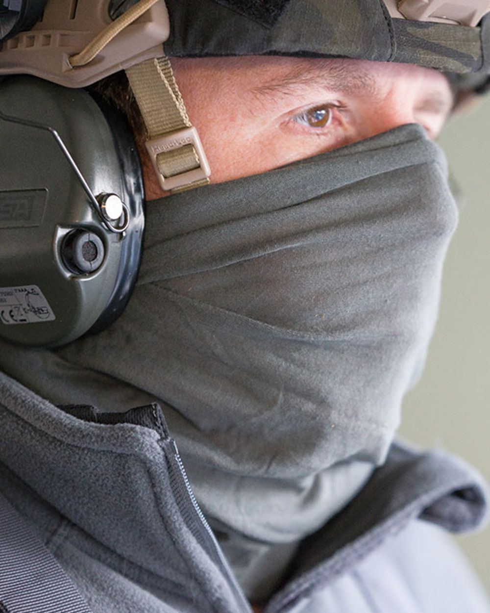 Titanium Coloured Viper Tactical Snood on blurry background 