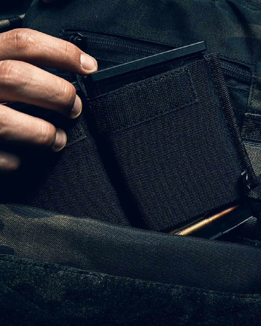 Black Coloured Viper VX Double Rifle Mag Sleeve XL on blurry background 