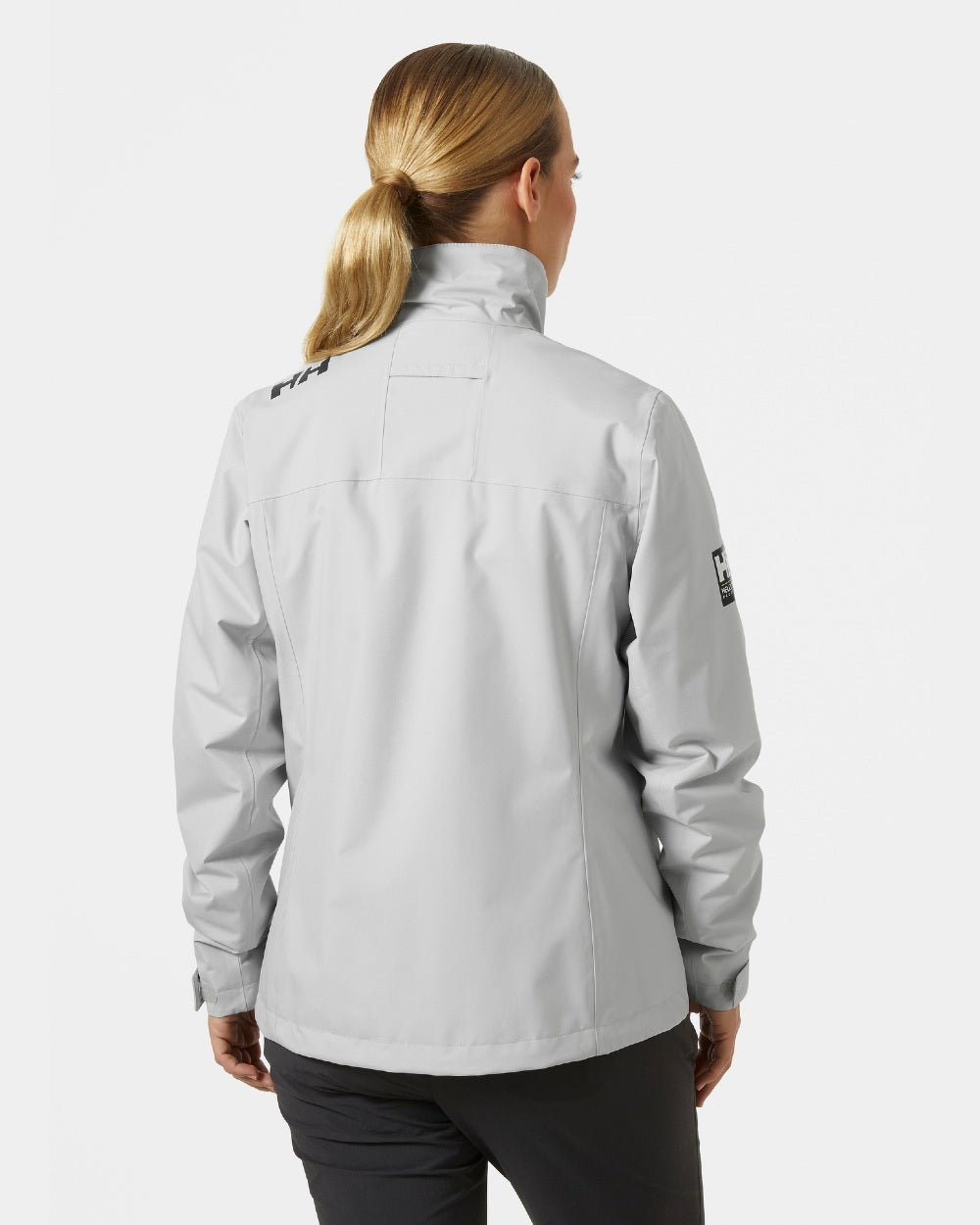 Grey Fog coloured Helly Hansen Womens Crew Midlayer Sailing Jacket 2.0 on grey background 