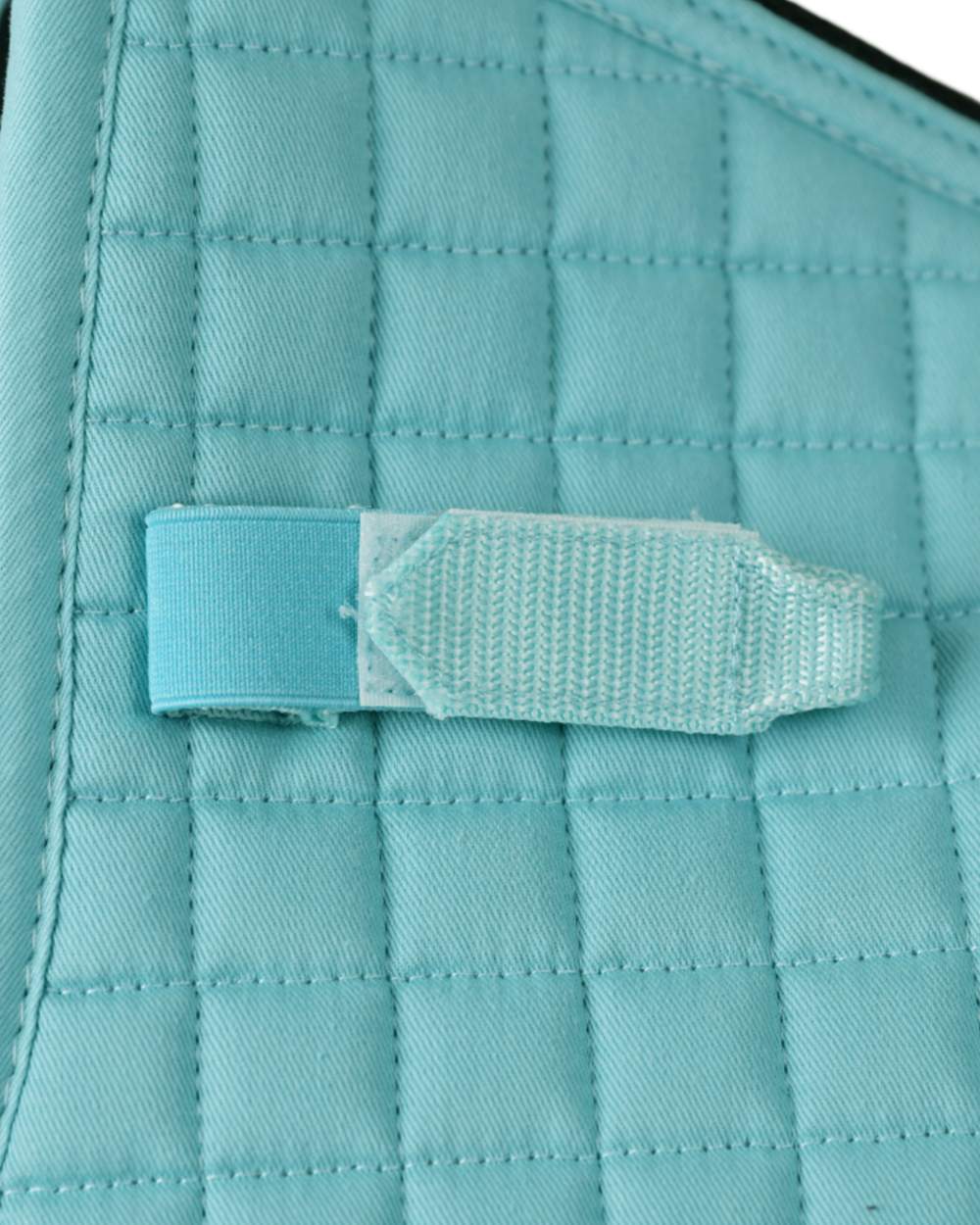 Light Aqua Coloured WeatherBeeta Prime Air-Tec All Purpose Saddle Pad on white background 