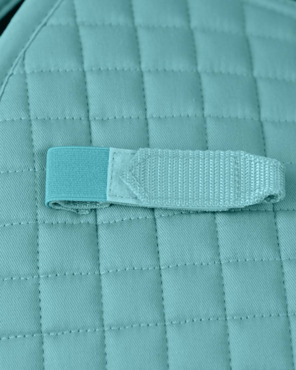 Light Aqua Coloured WeatherBeeta Prime Air-Tec Dressage Saddle Pad on white background 