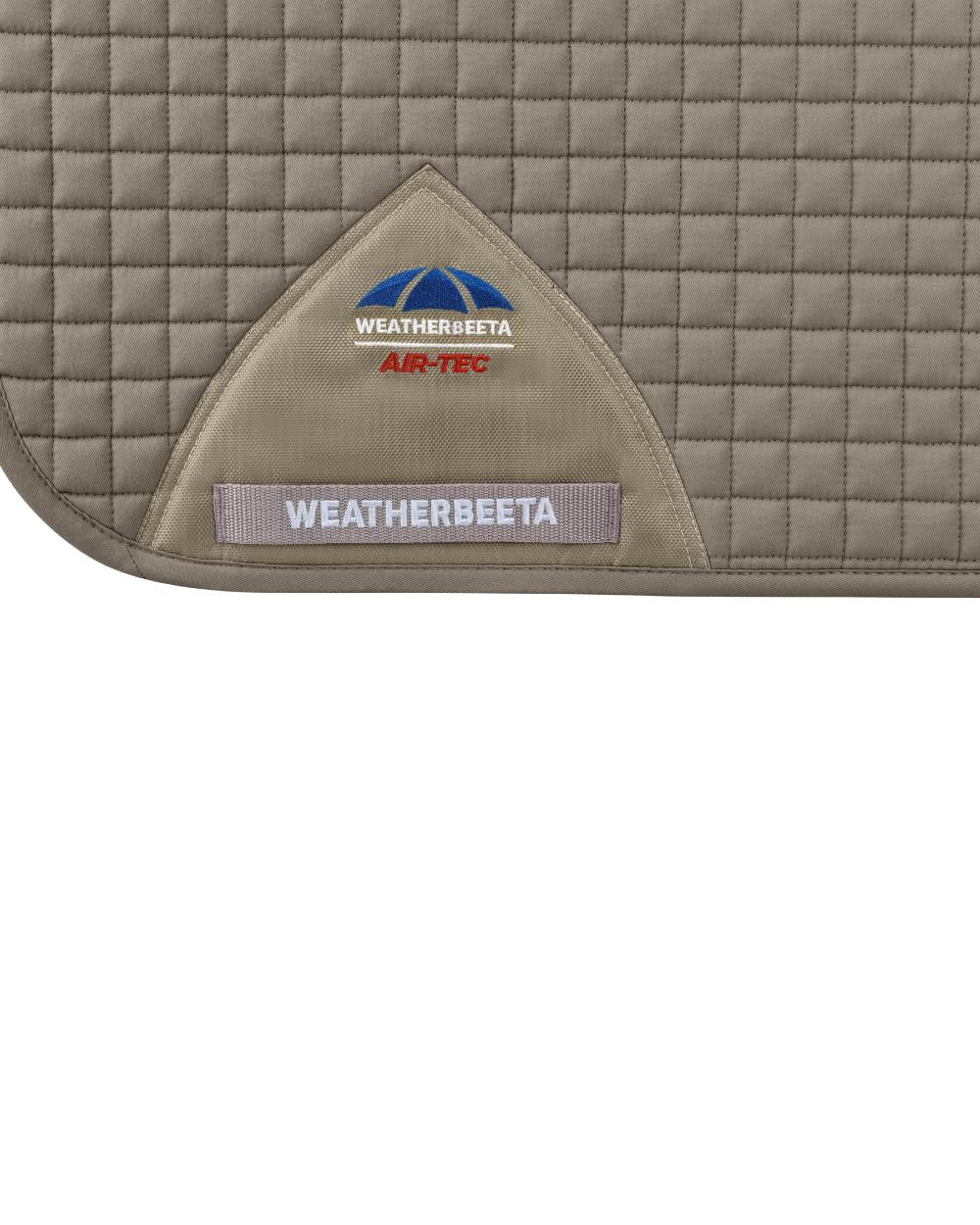 Natural Clay Coloured WeatherBeeta Prime Air-Tec Dressage Saddle Pad on white background 