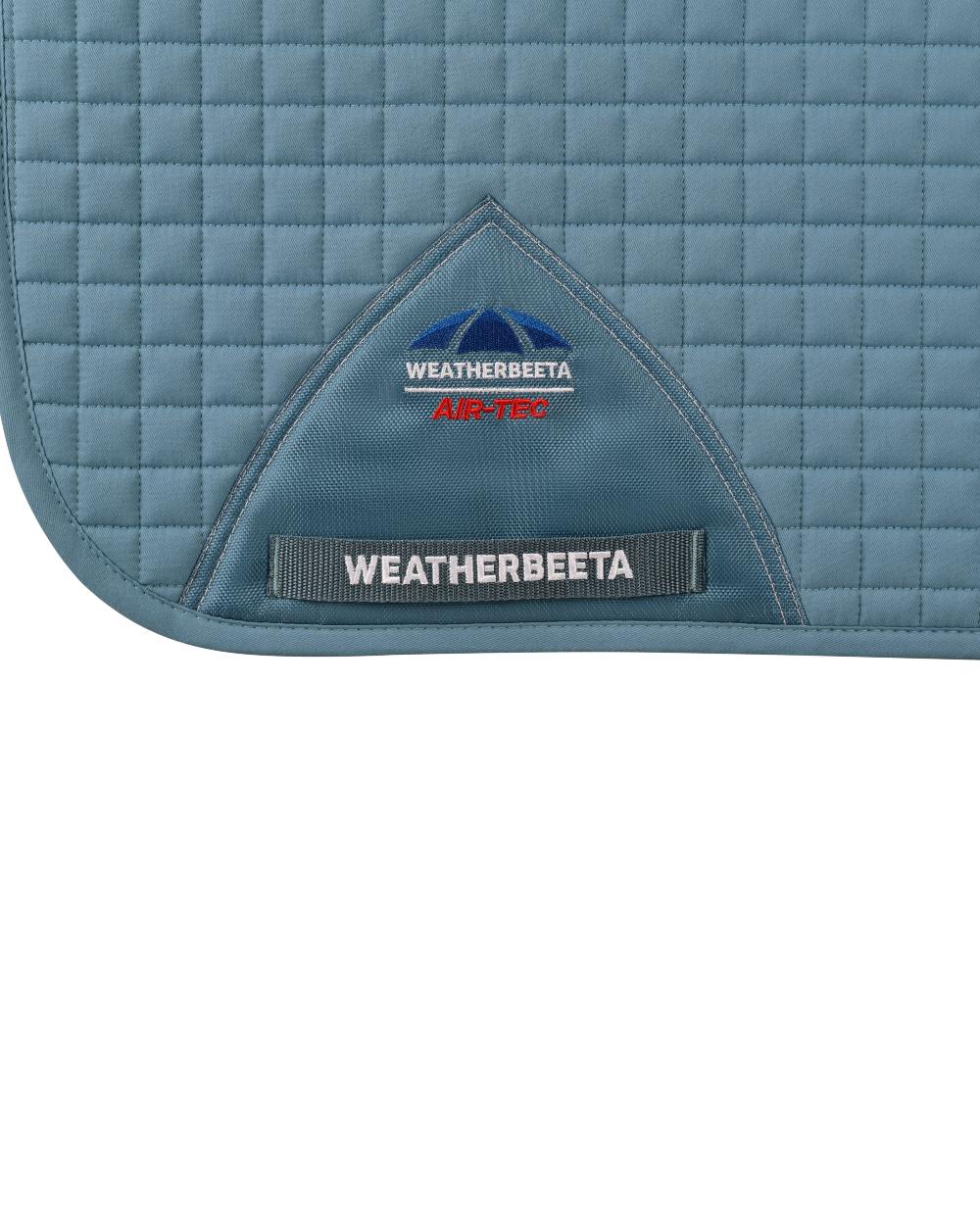 Washed Denim Coloured WeatherBeeta Prime Air-Tec Dressage Saddle Pad on white background 
